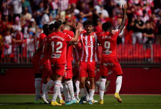 El Bilal Toure of Almeria celebrates after scoring their side's third goal with team mates during the LaLiga Santander match between UD Almeria and Rayo Vallecano at Juegos Mediterraneos on October 08, 2022 in Almeria, Spain.