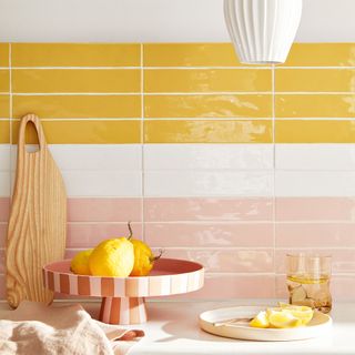 kitchen horizontal stripes pink white yellow tiles