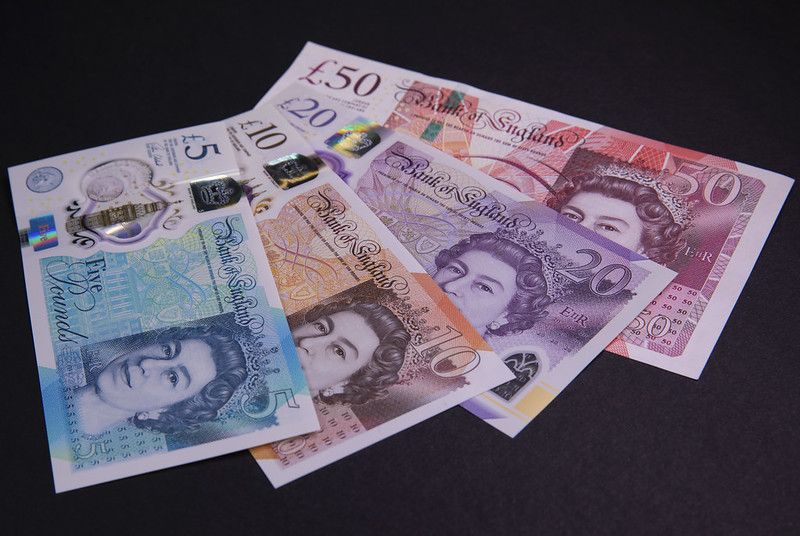 One of each of the UK bank notes in use today, spread in a fan shape