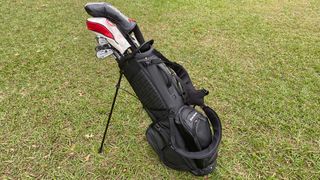SuperStroke Pantheon Stand Bag with clubs in