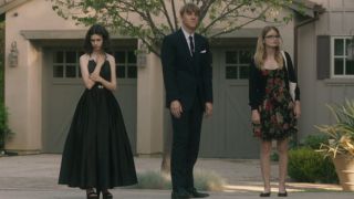 Maeve Press, Josh Thomas, and Kayla Cromer standing together in a driveway in Everything's Gonna Be Okay.