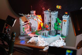 Lego Lion Knights' Castle surrounded by LED lights and smoke from Smoke Ninja