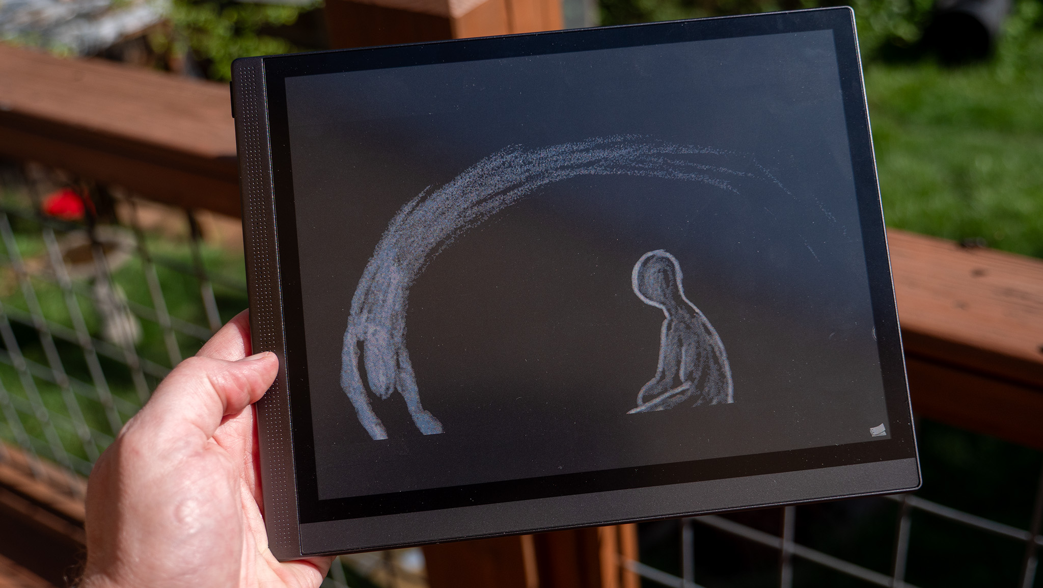 Showing off the Bigme B1051C Pro display in sunlight using a video with a black background
