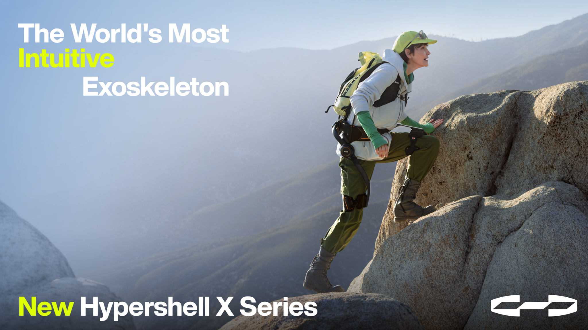 A person climbing a rocky mountain wearing the Hypershell X Ultra S