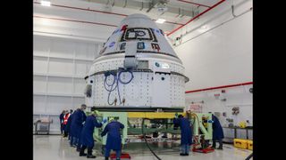 Engineers prepare Boeing's Starliner capsule for its second uncrewed test flight.