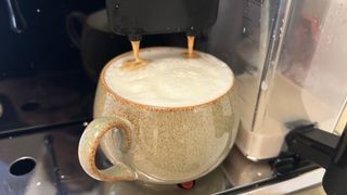 Gaggia Accademia making a cappuccino