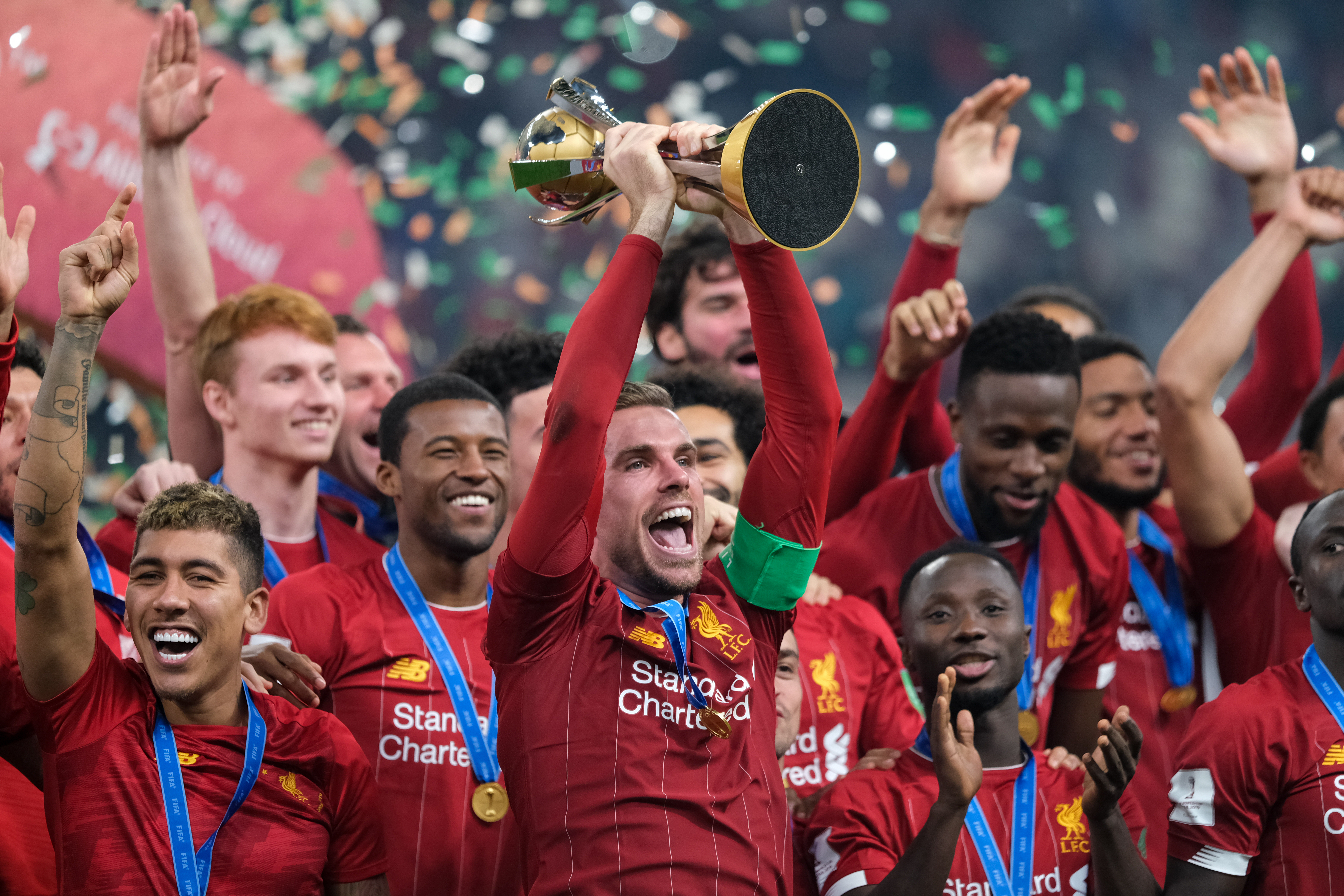 Liverpool players celebrate after beating Flamengo to win the FIFA Club World Cup in December 2019.