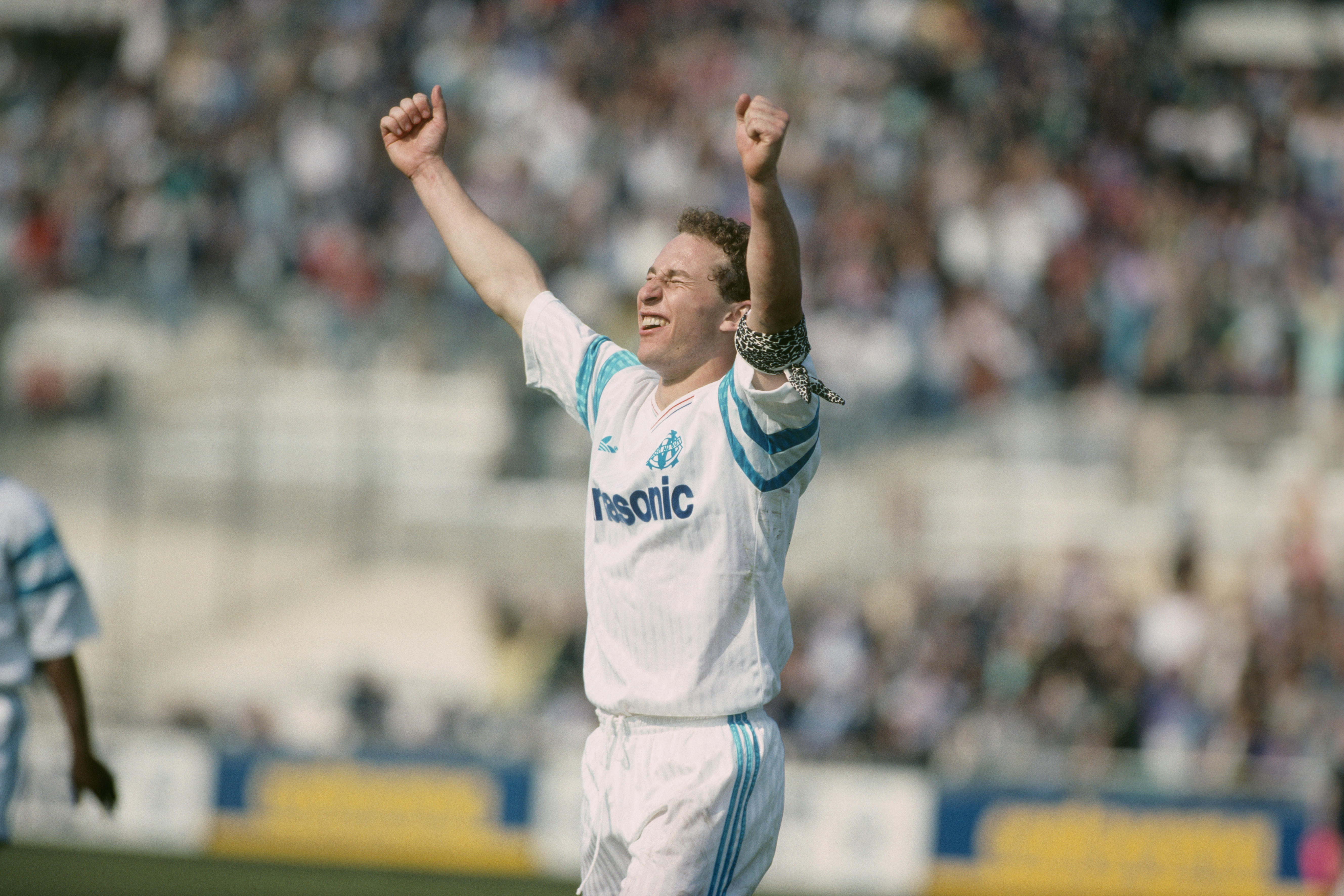 Jean-Pierre Papin celebrates after scoring a goal for Olympique Marseille.