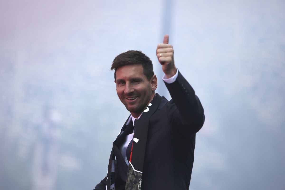 Lionel Messi was greeted by PSG fans outside the Parc des Princes on Wednesday