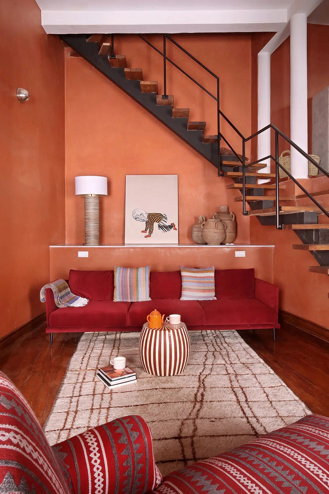A colorful Moroccan riad has been transformed into a kaleidoscope of patterned textiles, striking artwork, and eye-catching tiles.