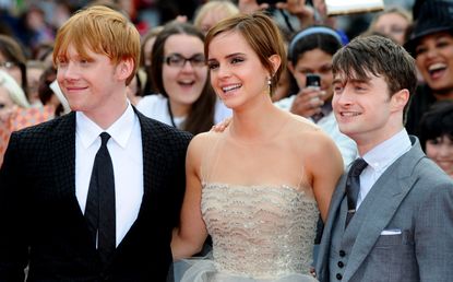 Actor Rupert Grint, Emma Watson and Daniel Radcliffe attend the 'Harry Potter and the Deathly Hallows: Part 2' Premiere in Trafalgar Square on July 07, 2011 in London