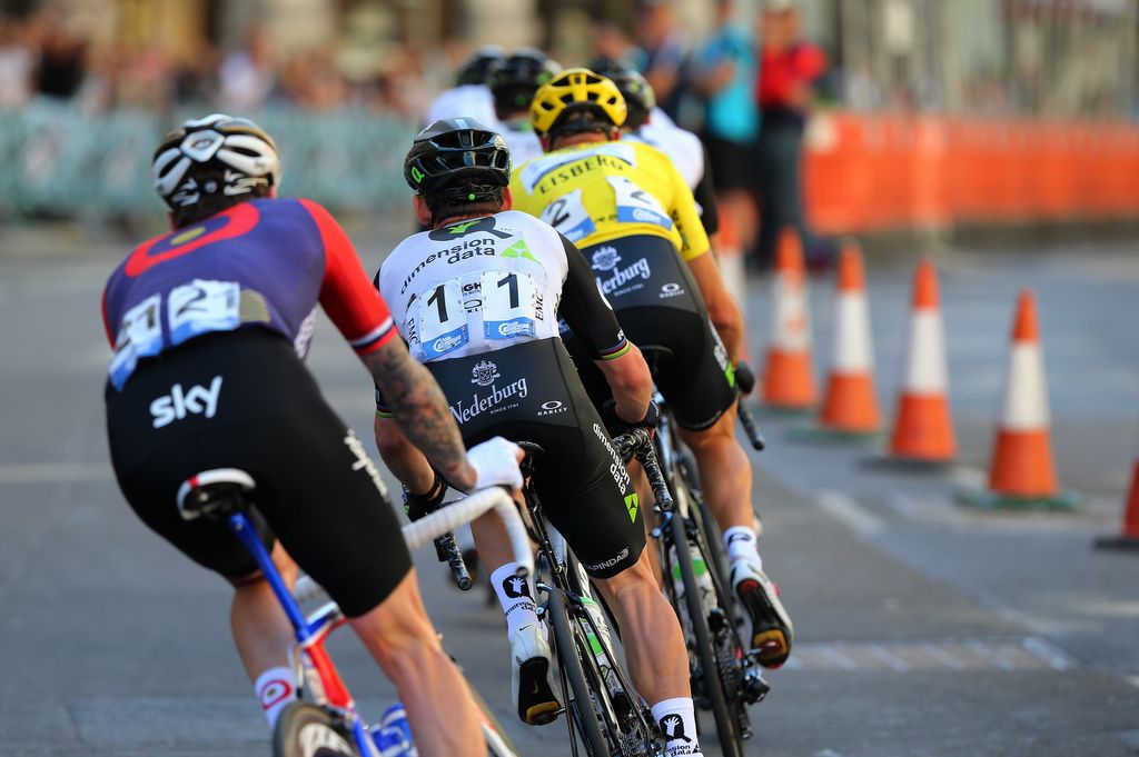 Bradley Wiggins following Mark Cavendish and Steve Cummings during the race