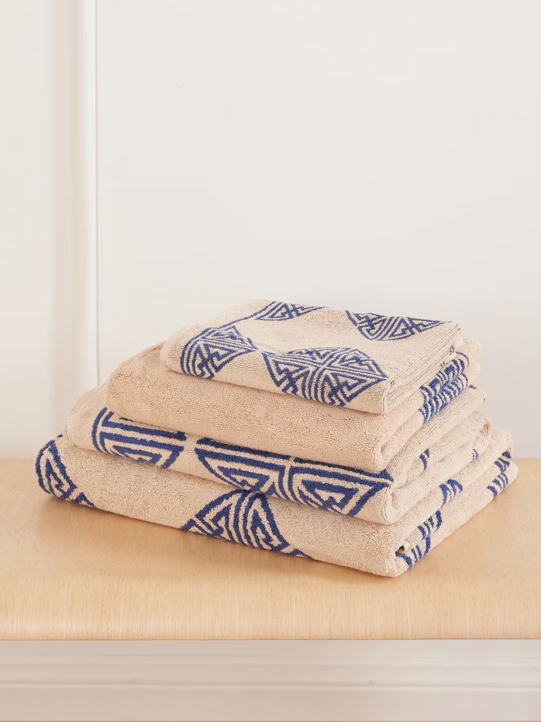 A geometric blue patterned towel from Autumn Sonata