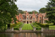 The west front of Longstowe, an Elizabethan house much rebuilt in the 19th century and recast by John Simpson in 1907–14. Longstowe Hall, Cambridgeshire, photographed by Will Pryce for Country Life.