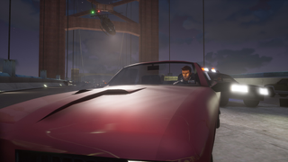 A character waits in a car in GTA3.