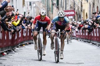 Kasia Niewiadoma of Canyon-SRAM tries to stay ahead of Demi Vollering of SD Worx-Protime on climb into Siena for final spot on podium at Strade Bianche Women