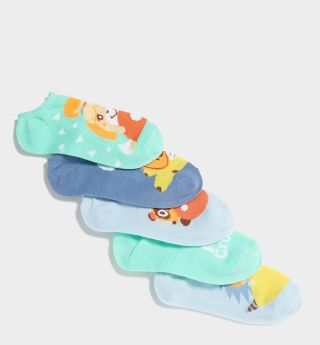 Animal Crossing socks stacked on top of one-another against a plain background