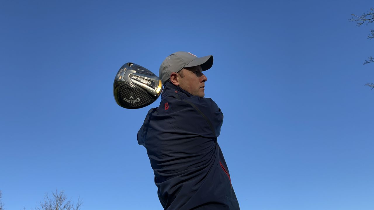A golfer swings the Callaway Rogue ST Max driver