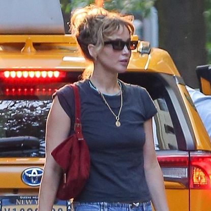 Jennifer Lawrence wears a pair of drawstring jeans with a gray tshirt in New York City