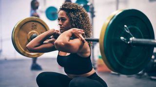 Woman performing the front squat