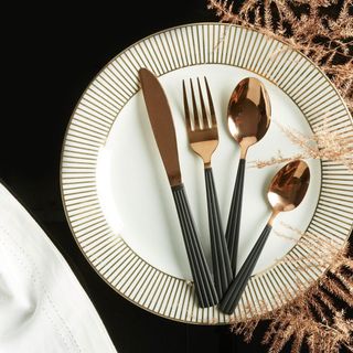 tableware with cutlery and table