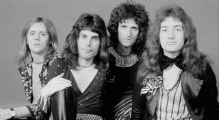 A classic black-and-white portrait of Queen: [left to right] Roger Taylor, Freddie Mercury, Brian May, John Deacon