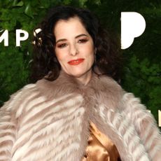 Parker Posey wears a white Gucci bag in NYC 