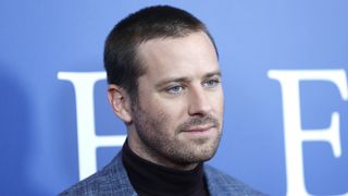 a headshot of Armie Hammer at an event in 2018