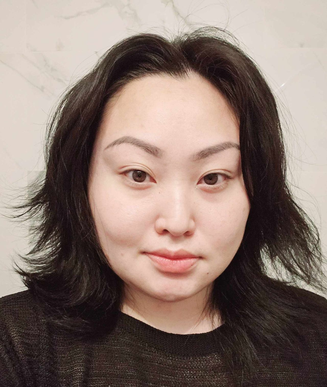 Pang, a Marie Claire Tester, before testing Oribe Curl Gloss Hydration &amp; Hold