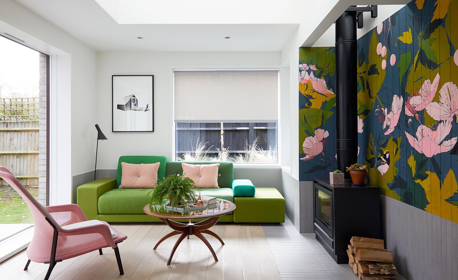 The ground level features the living spaces, lined in oiled oak and grey Mosa ceramic tile flooring.