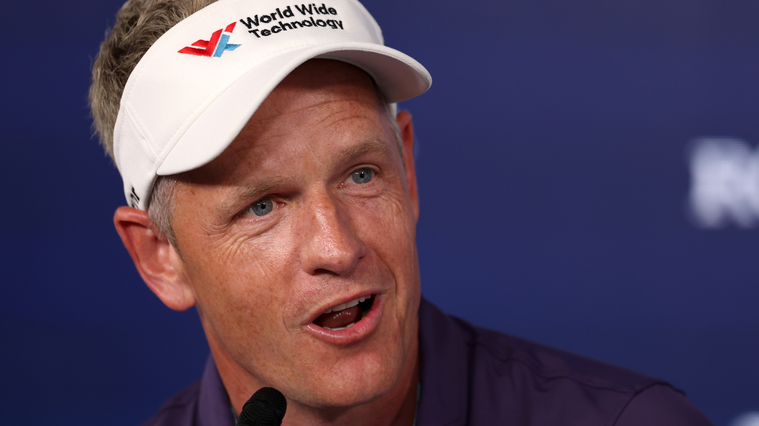 Luke Donald speaks to the press before the PGA Championship