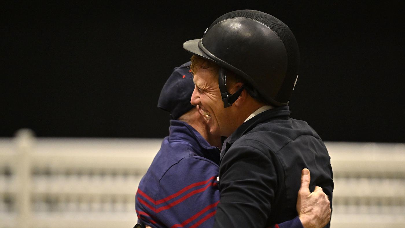 Matt Sampson congratulated by John Whitaker at London Excel