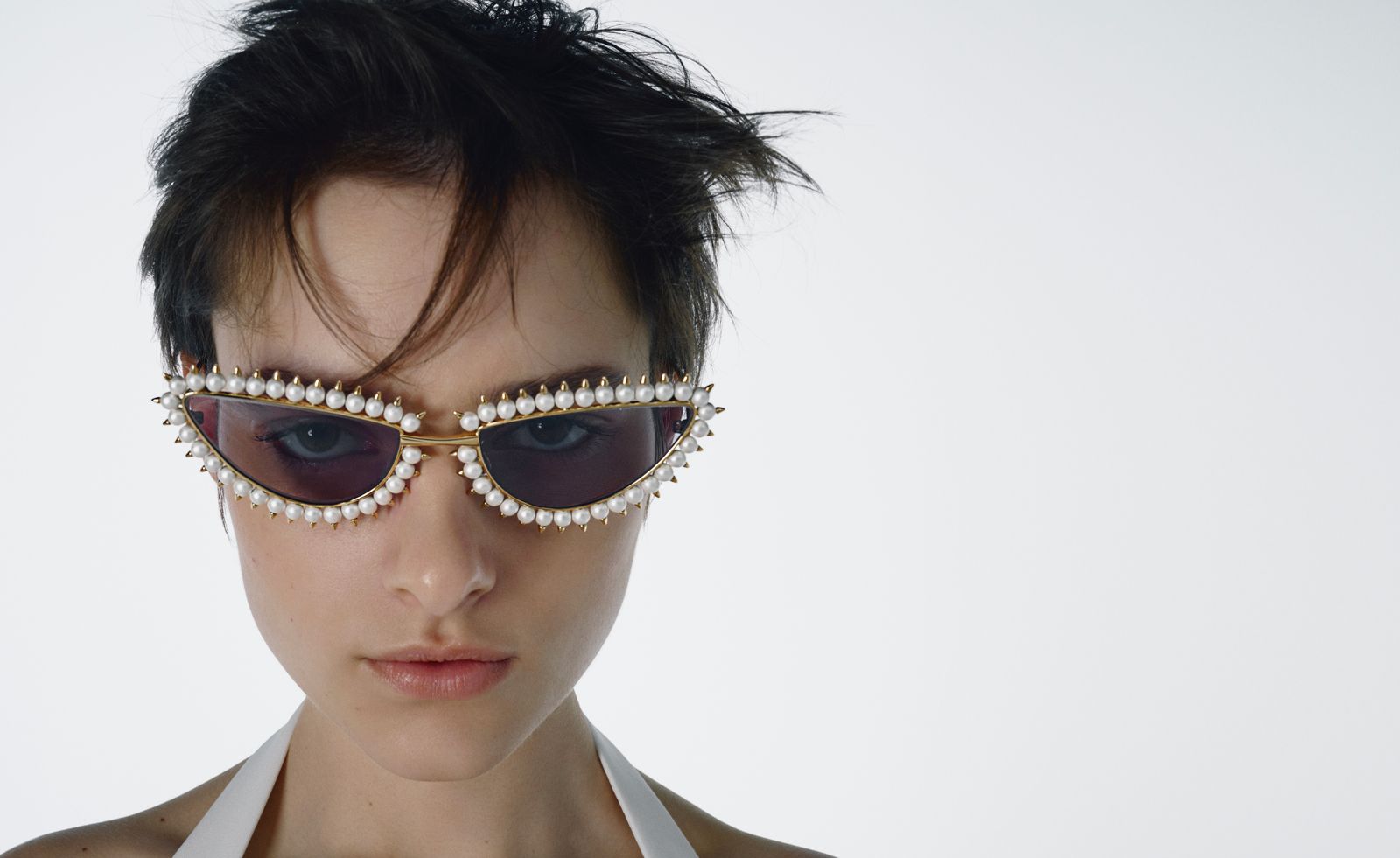 woman in pearl sunglasses