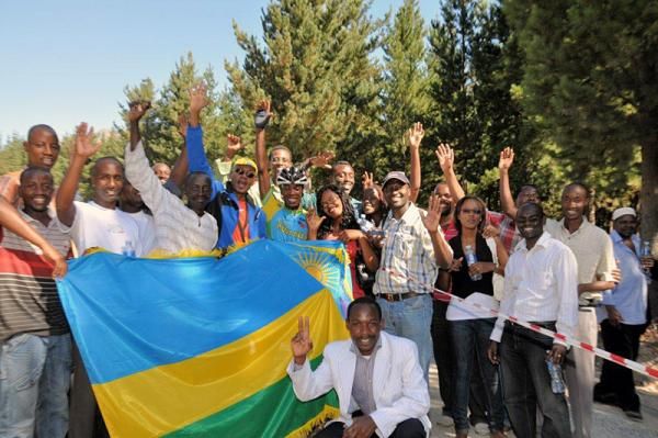 Adrien Niyonshuti and fans after he became the first ever Rwandan to qualify for the Olympics.