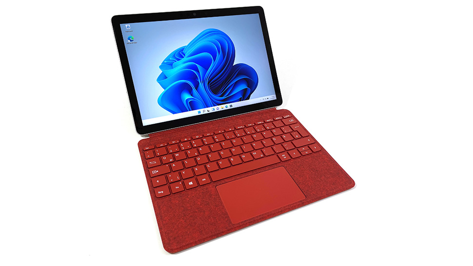 Microsoft Go 3 with red keyboard.