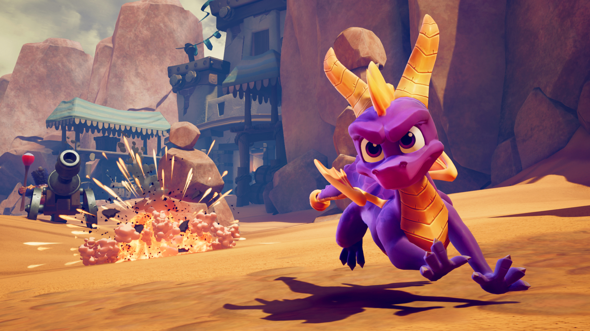 Spyro the dragon running across a desert
