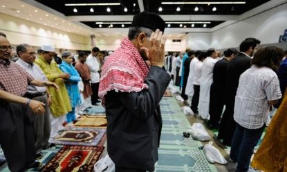 Muslims pray during end-of-Ramadan holidays in Los Angeles