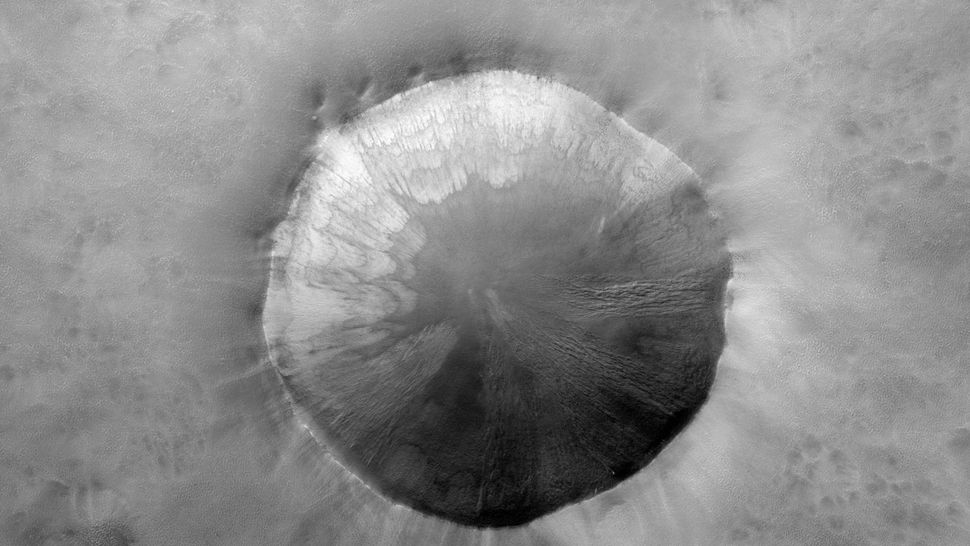 NASA Mars satellite uncovers markings 'like paint dripping down a wall ...