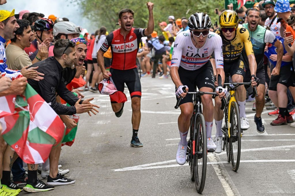 UAE Team Emirates Slovenian rider Tadej Pogacar L JumboVismas Danish rider Jonas Vingegaard R cycle on the col de Pike during the 1st stage of the 110th edition of the Tour de France cycling race 182 km departing and finishing in Bilbao in northern Spain on July 1 2023 Photo by Bernard PAPON POOL AFP Photo by BERNARD PAPONPOOLAFP via Getty Images