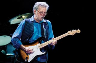 Eric Clapton performs with a 2014 Fender Custom Shop Stratocaster