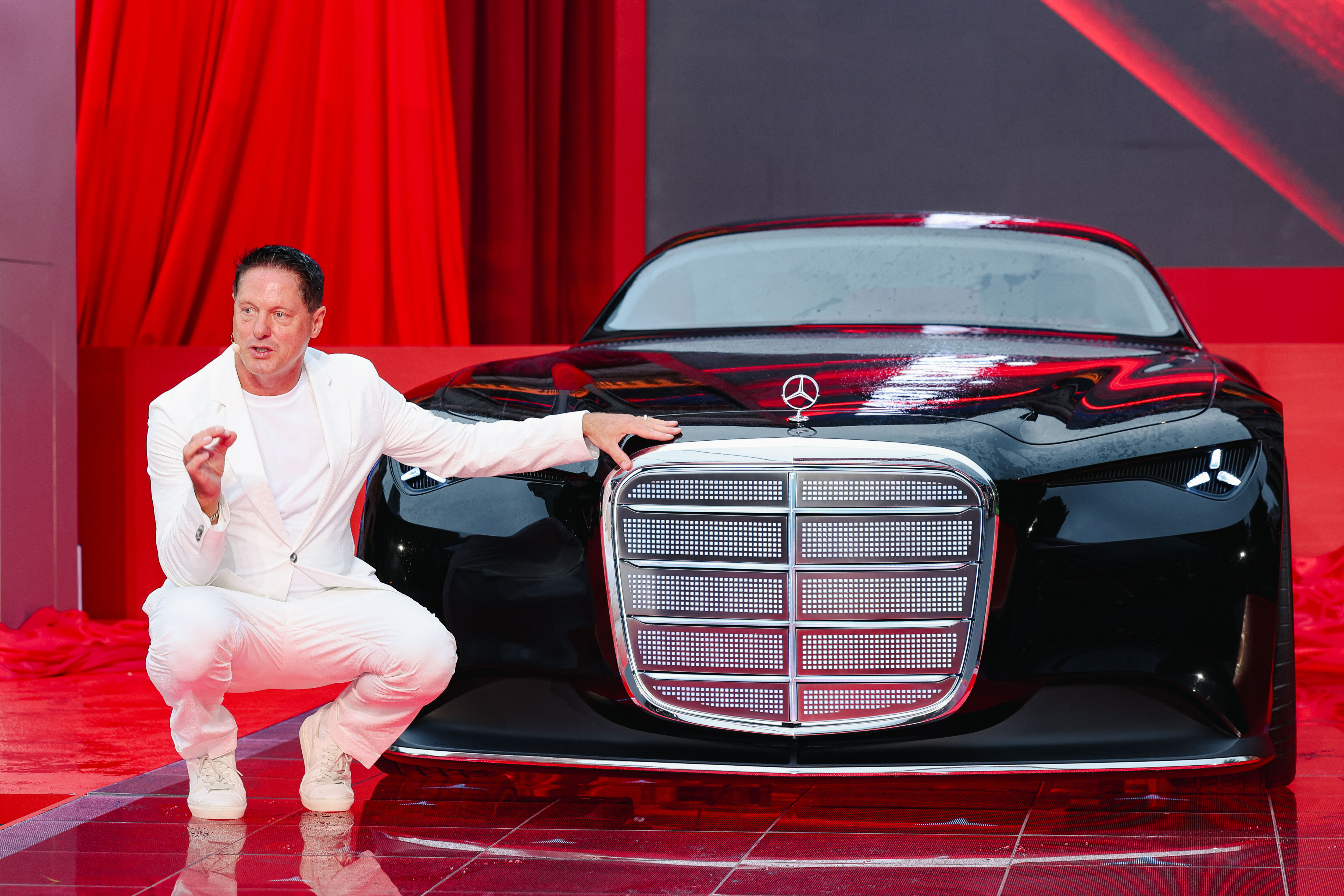 Mercedes-Benz Chief Design Officer Gorden Wagener with the Vision Iconic concept at its launch in Shanghai, October 2025