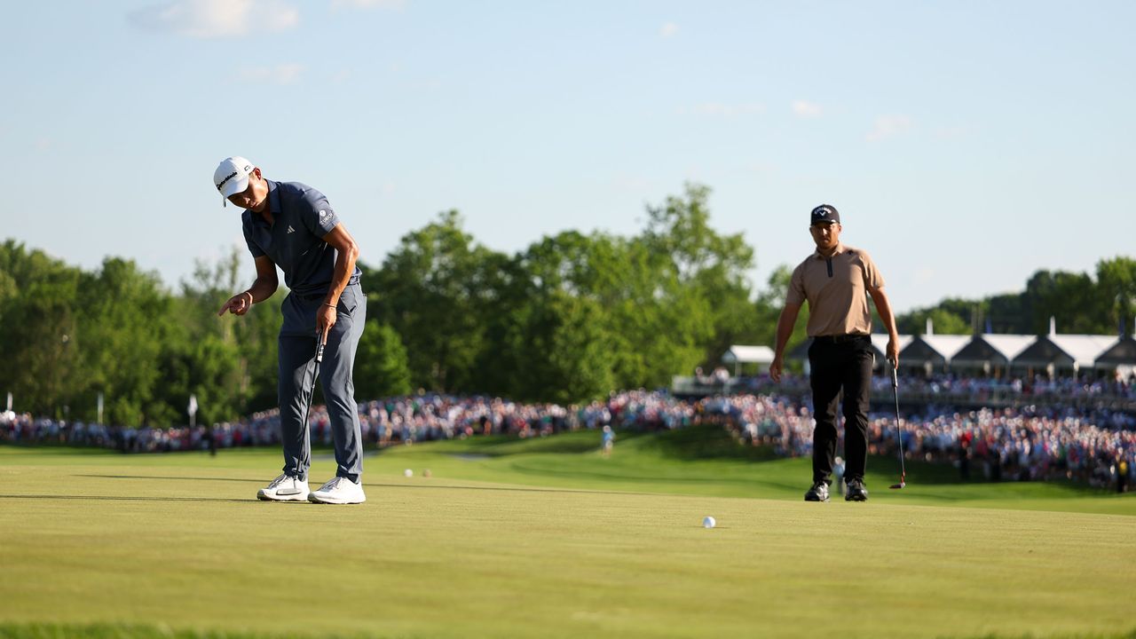 Collin Morikawa making a putt in front of Xander Schauffele in the final round of the PGA Championship 2024