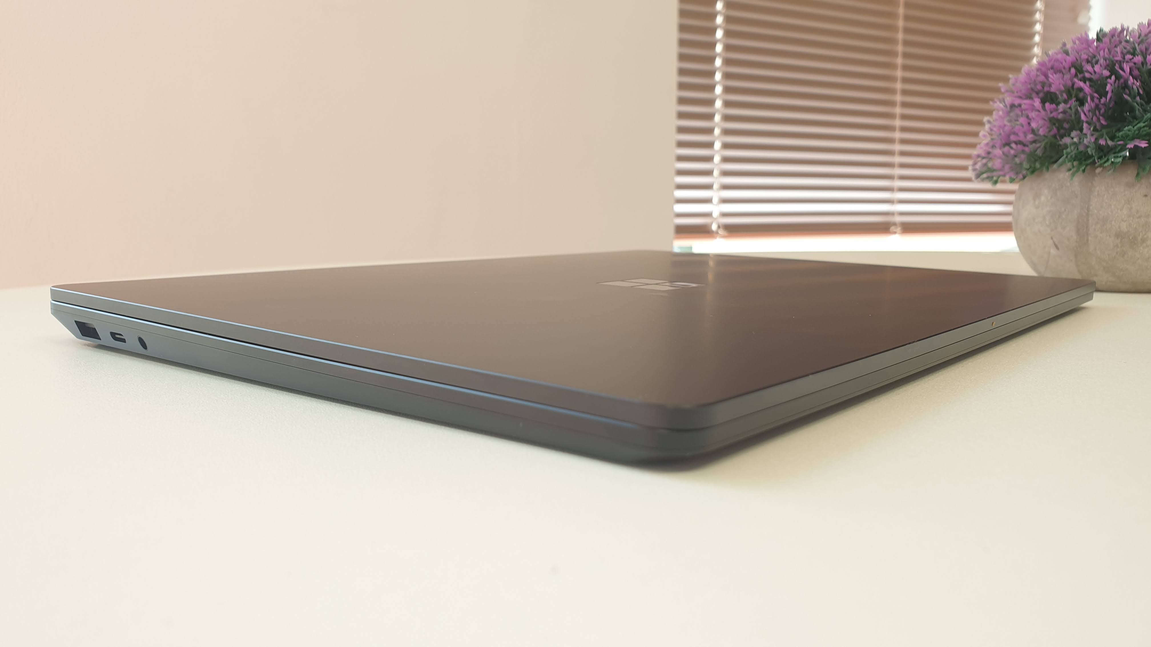 Surface Laptop 4 on a wooden table in an office