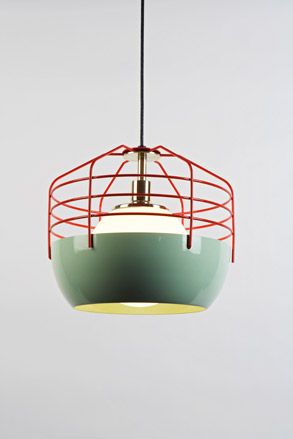 Green hanging ceiling light with red cage