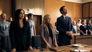 Lana Parilla as Lisa Trammell, Becki Newton as Lorna Crane and Manuel Garcia-Rulfo as Mickey Haller in a courtroom in The Lincoln Lawyer season 2 episode 10