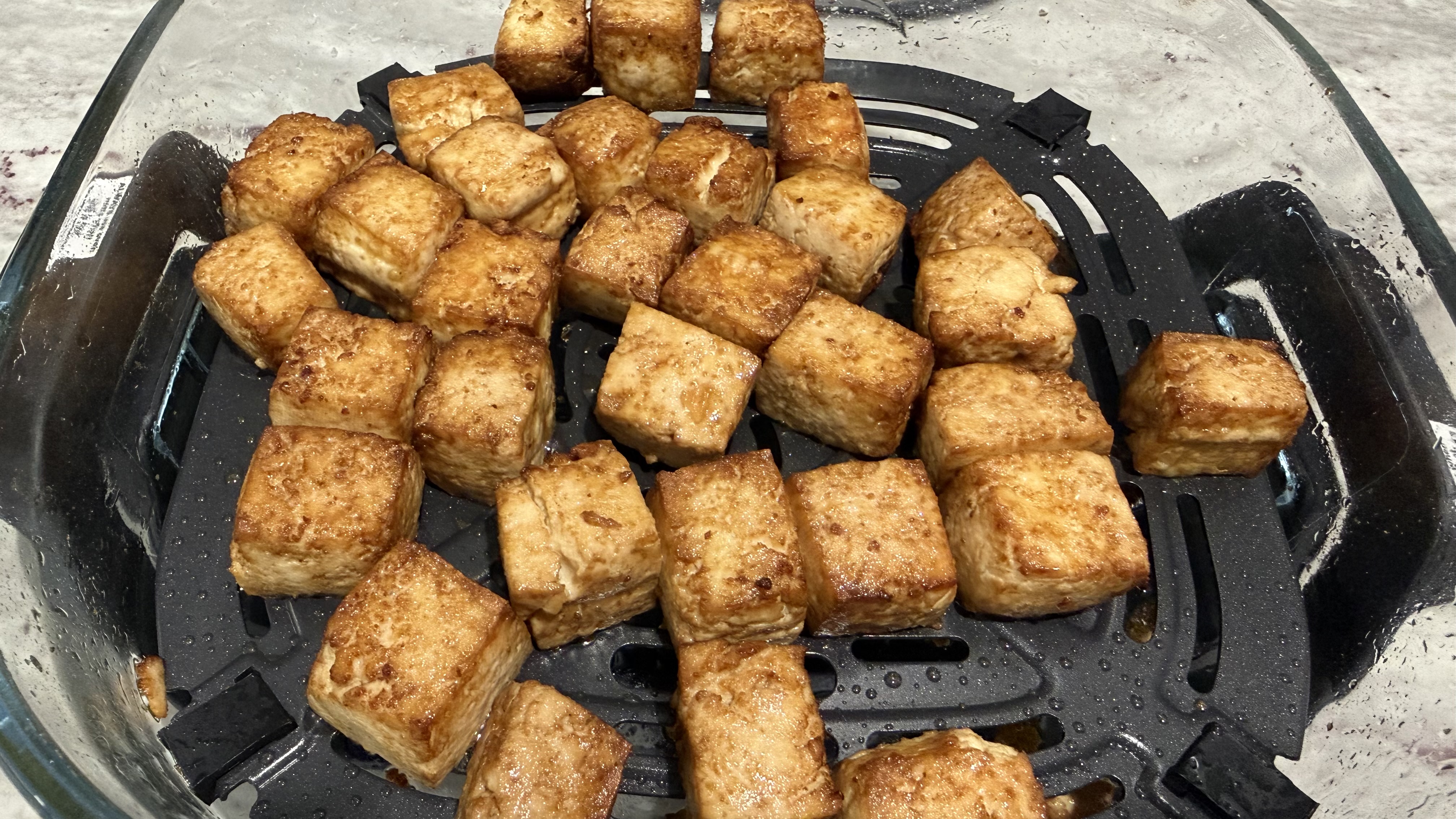 Food made in the Ninja Crispi Pro 6-in-1 Countertop Glass Air Fryer on Air Fry mode