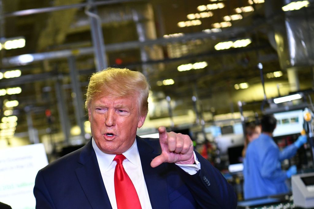 Trump visits an Apple plant