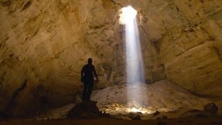 Steve in a cave in the Oman desert