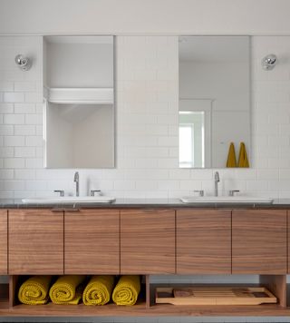 A bathroom with storage towels