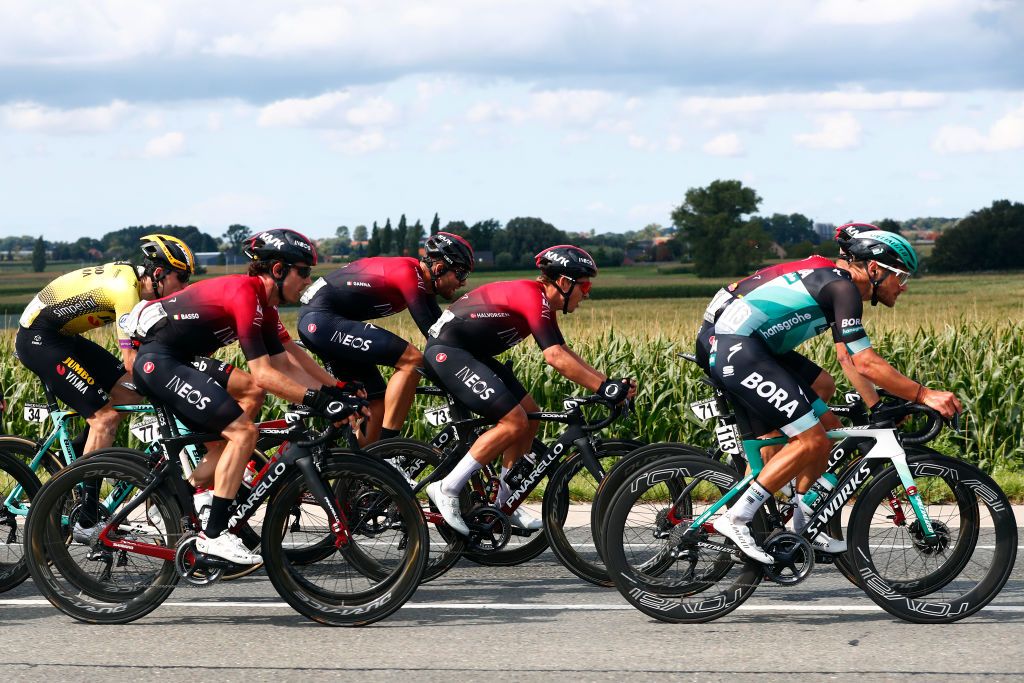 A side view of Team Ineos the peloton
